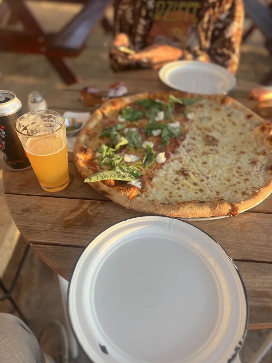 Pizza on an outdoor table at Pescadero 62