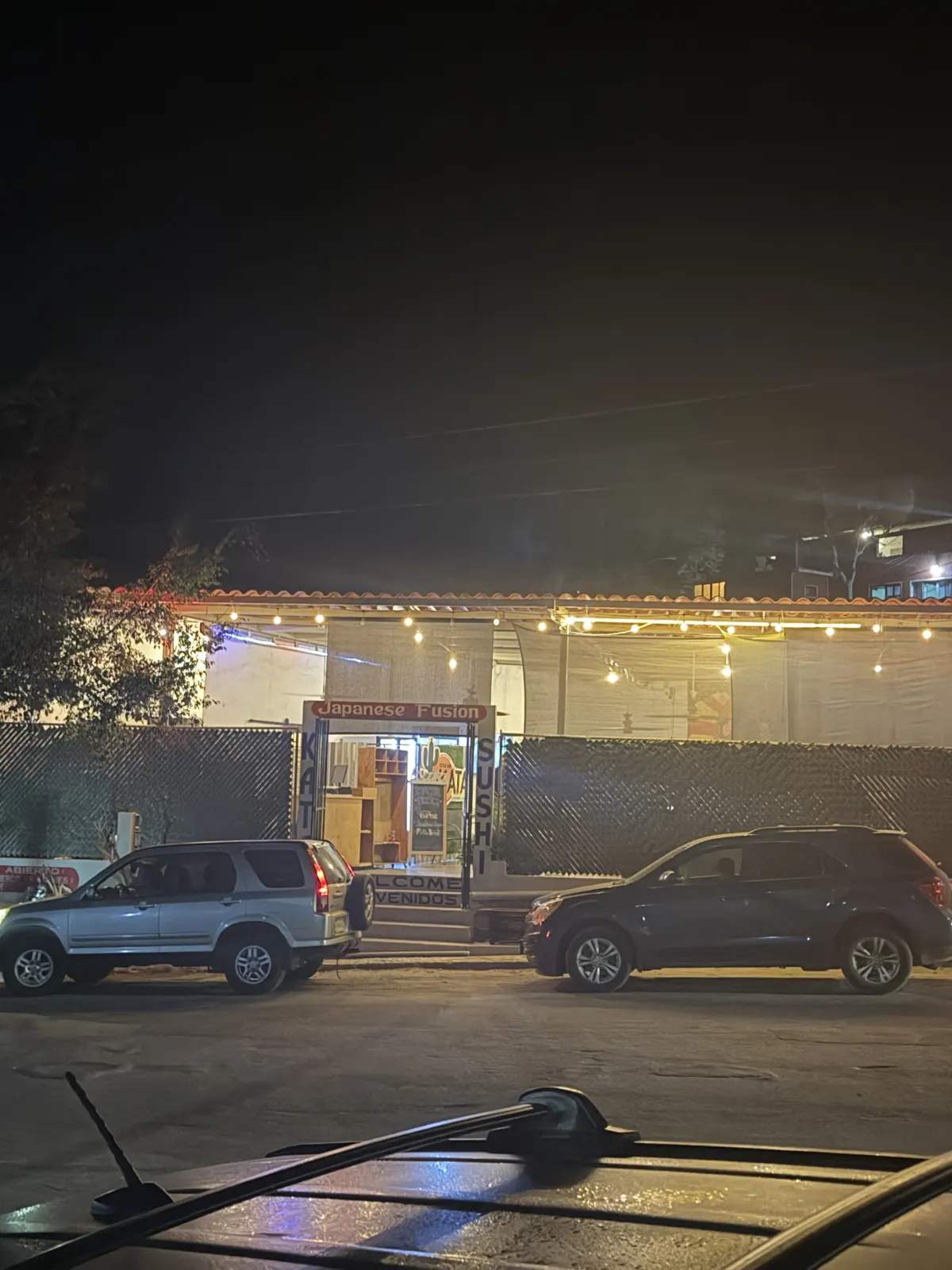 Sushi Bar Kata exterior at night in El Pescadero